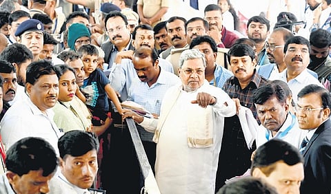 Chief Minister Siddaramaiah interacts with citizens during a Janaspandana programme at his official residence  in Bengaluru on Monday | NAGARAJA GADEKAL