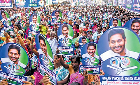 A large number of people took part in the YSRC Bus Yatra at Nellimarla I Express