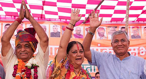 ormer Chief Minister Vasundhara Raje with BJP candidate from Bilara constituency Arjunlal Garg and Bhopalgarh constituency Kamsa Meghwal during a rally in Jodhpur district on Nov. 2, 2023. (PTI)