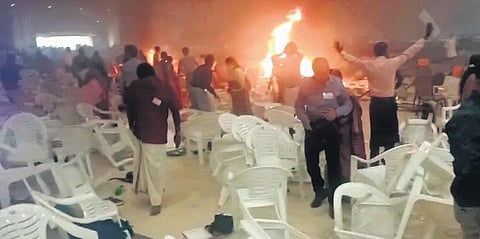 FILE: Fire breaks out after the triple blasts during the Jehovah’s Witnesses prayer meeting at Zamra International Convention Centre in Kalamassery | Express