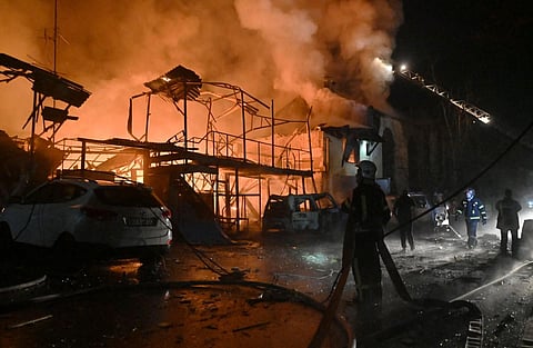 Ukrainian firefighters extinguish a fire following an overnight Russian drone strike in Kharkiv on November 3. (Photo | AFP)