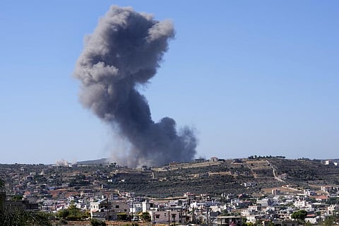 Black smoke rises from an Israeli airstrike on the outskirts of Aita al-Shaab, a Lebanese border village with Israel, south Lebanon, on Nov 4, 2023. (AP)