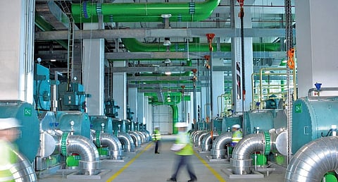 Chilled water is transferred to  buildings through underground network of insulated pipes in district cooling system | express