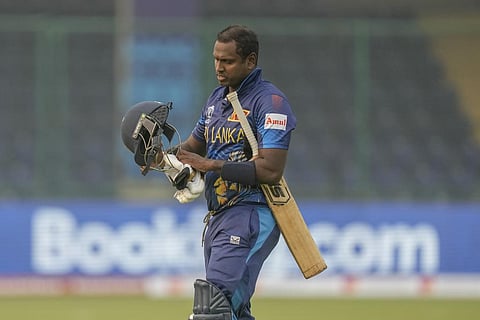 Sri Lanka's Angelo Mathews walks off the field after he was declared timed out during the ICC Men's Cricket World Cup match against Bangladesh in New Delhi, Nov. 6, 2023. (Photo | AP)