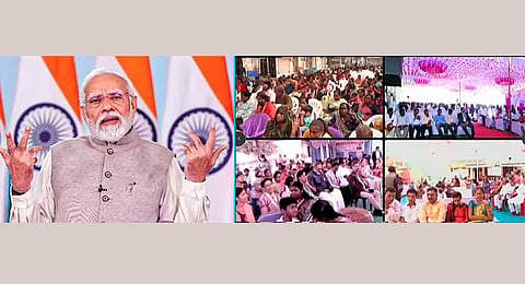 Prime Minister Narendra Modi addresses beneficiaries of 'Viksit Bharat Sankalp Yatra' via a video conference, on Thursday, Nov. 30, 2023.  (PTI)