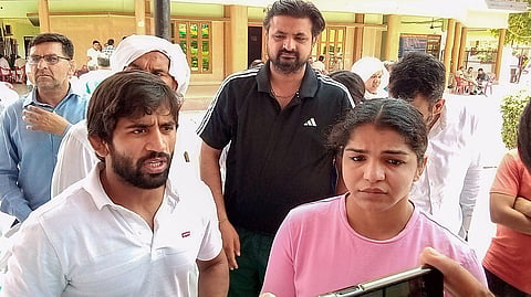 FILE PHOTO | Wrestlers Bajrang Punia and Sakshi Malik during a 'mahapanchayat' in Sonipat, June 10, 2023 | PTI
