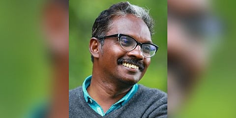 Dr Biju