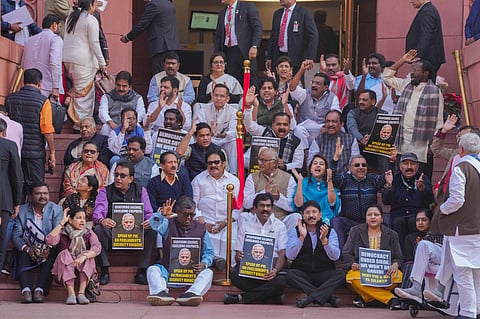 Suspended Opposition MPs protest during the Winter session of Parliament, in New Delhi on Tuesday | PTI