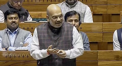 Union Home Minister Amit Shah speaks in the Lok Sabha during the Winter session of Parliament. (File photo | PTI)