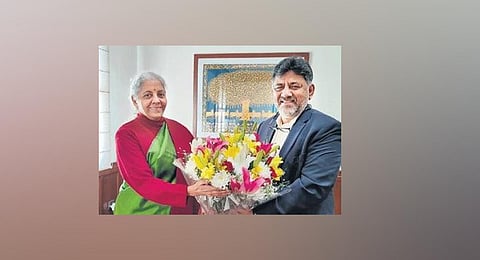 Deputy CM DK Shivakumar greets Union Finance Minister Nirmala Sitharaman in New Delhi on Wednesday. (Photo | Express)