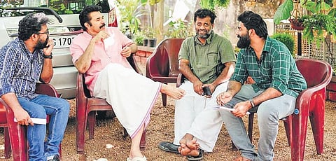 Mammootty with Jeo Baby, Adarsh Sukumaran and Paulson Skaria  on the sets of Kaathal - The Core
