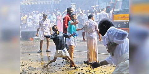 Congress activists hurling stones at the police during the march in Trivandrum on dec 23, 2023 (Photo  | Express)
