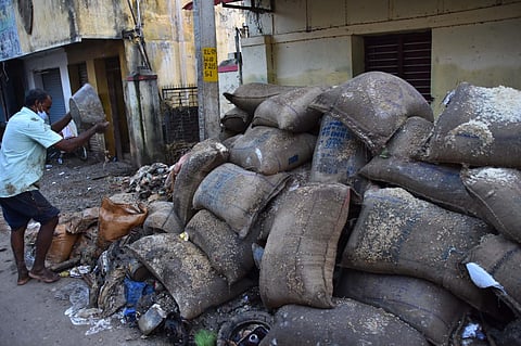 Ration shop rice was thrown away in the flood-affected area at Eral in Thoothukudi | V Karthikalagu