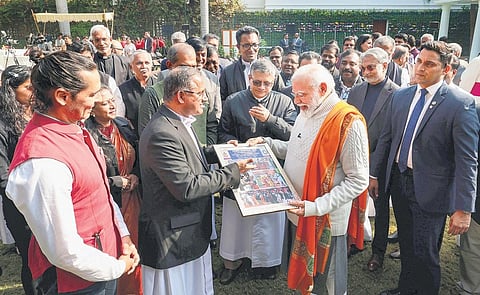 Prime Minister Narendra Modi with Christian community members during  Christmas celebrations in New Delhi on Monday | pti