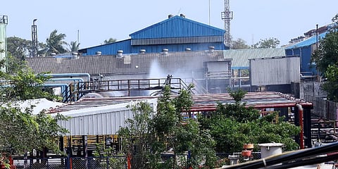 Foam used for putting out fire coming out from the   place where the fire occured  inside IOCL (Photo | P. Ravikumar, EPS)