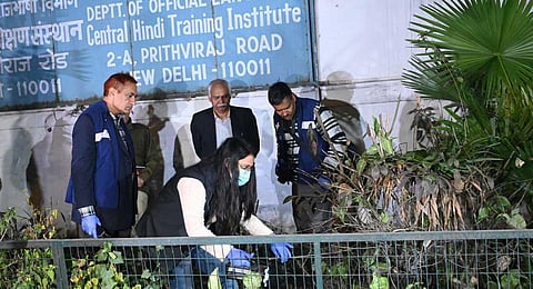 Delhi Police and forensics teams at the blast site near the Israel embassy in Delhi. (Photo| Parveen Negi)