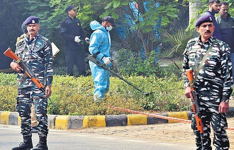 National Security Guard forensics team inspects an area behind the Israel embassy in New Delhi on Wednesday, after a low-intensity blast on Tuesday. (Photo | Parveen Negi, EPS)