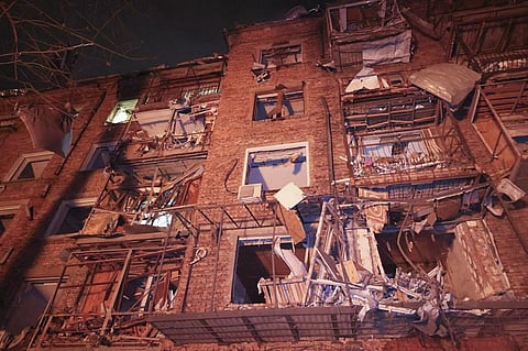 An  apartment building hit by a Russian missile is seen in Kharkiv, Ukraine, Saturday, Dec. 30, 2023. | AP