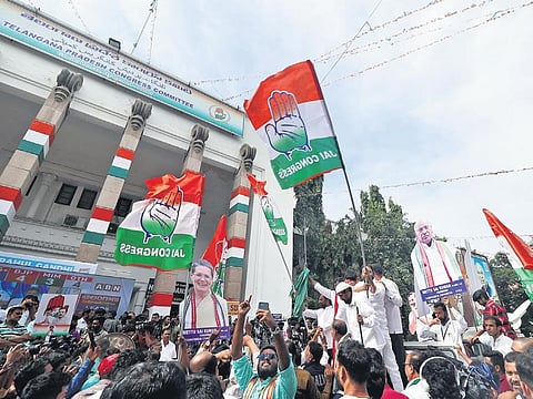 Congress workers celebrate the party’s victory in the Telangana Assembly elections, in Hyderabad on Sunday |   Sri Loganathan Velmurugan