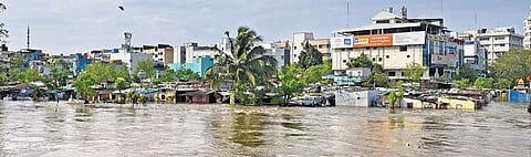 A slum in Saidapet, Chennai, got submerged in water due to flooding of Adyar river.  (Photo | Shiba Prasad Sahu, EPS)