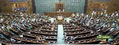 Lok Sabha Speaker Om Birla conducts the proceedings of the House during the Winter session of Parliament, in New Delhi on Friday | PTI