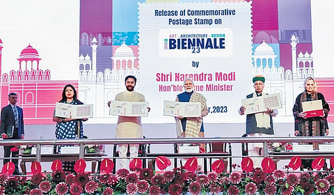 PM Narendra Modi with Union Ministers G Kishan Reddy and Arjun Ram Meghwal at the first Indian Art, Architecture and Design Biennale 2023 at Red Fort. (Photo | Express)