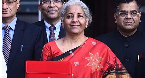 Finance Minister Nirmala Sitharaman with the Budget Papers outside Finance Ministry in New Delhi on Wednesday. (Photo | Parveen Negi, EPS)