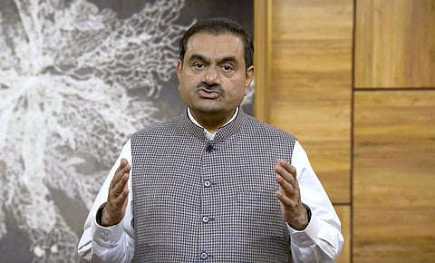 Indian billionaire Gautam Adani addressing investors from an unknown location. (Photo | AP)