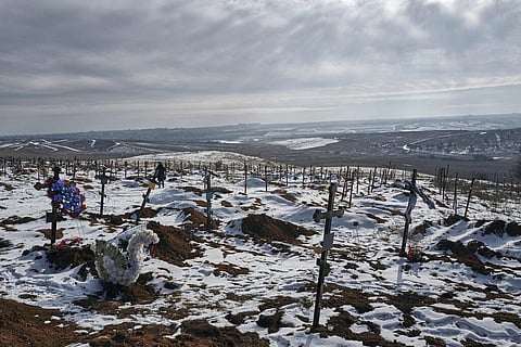 New graves and crosses are scattered in a city cemetery in Bakhmut, Donetsk region, Ukraine, Friday, Feb. 10, 2023. (Photo | AP)