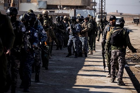 In this image dated, February, 2022, US backed Syrian Democratic Forces soldiers search for Islamic State militants in Hassakeh, Syria. (File Photo | AP)