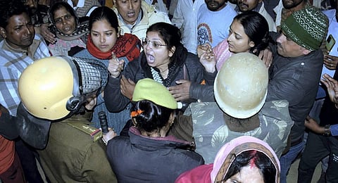 Villagers in a scuffle with police officers after mother and daughter were reportedly burnt alive during an anti-encroachment drive, in Kanpur Dehat. (File photo | PTI)