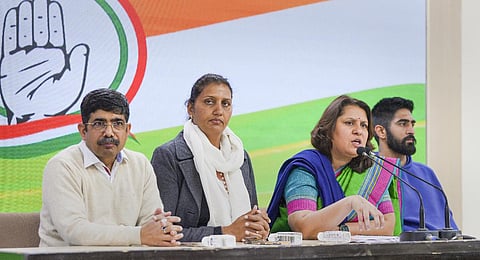 Krishna Poonia (second from left)  with Supriya Shrinate and Vijender Singh addresses a media briefing, at AICC Headquarters in New Delhi on Jan. 20, 2023. (Photo | PTI)