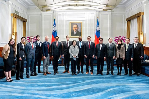 Taiwan's President Tsai Ing-wen (C) and Taiwanese officials pose for photos with a U.S. delegation during a meeting at the Presidential Office in Taipei,  Feb. 21, 2023. (Photo | AP)