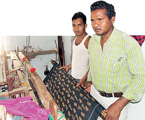 Image used for representational purpose. Rajendra Sikandar (in green shirt) along with a weaver in Bargarh  | Express