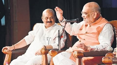 Union Home Minister Amit Shah and Chief Minister Basavaraj Bommai at an event at Town Hall in Bengaluru on Thursday | Express