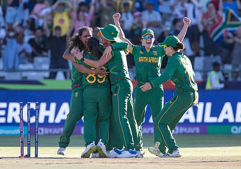 South African players celebrate after defeating England in the semi-final of the ICC T20 Women's World Cup in Cape Town, Feb. 24, 2023. (Photo | AFP)