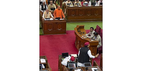 UP CM Yogi Adityanath and Samajwadi Party President & MLA Akhilesh Yadav during the Budget Session of UP Assembly, in Lucknow, Feb. 25, 2023. (Photo | PTI)