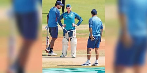 Australian stand-in skipper Steve Smith with India head coach Rahul Dravid and R Ashwin during a practice session ahead of the 3rd Test, in Indore on Monday | PTI
