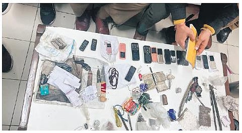 348 mobile phones, their chargers and other incriminating material such as sharp-edged knives were recovered by the prison authorities during multiple raids.(Photo | Express)