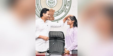 ​  CM Jagan blessing a student during the launch of Jagananna Videshi Vidya Deevena programme at his camp office on Friday | Express  ​