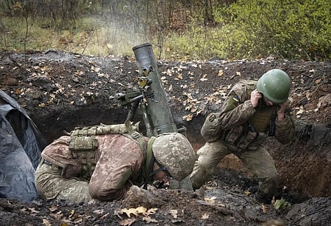 Ukrainian soldiers fire a mortar in the front line near Bakhmut, in the Donetsk region, Ukraine. (File Photo | AP)