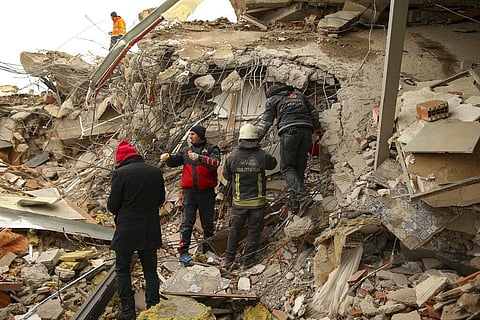 Rescue workers search for survivors on a collapsed building in Malatya, Turkey, Tuesday, Feb. 7, 2023.  (Photo | AP)