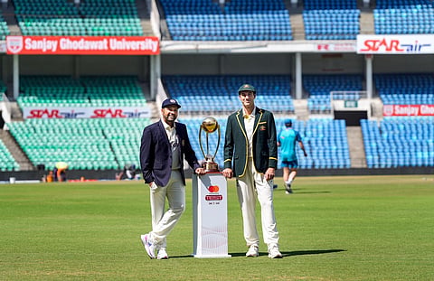 Indian captain Rohit Sharma and his Australian counterpart Pat Cummins pose with the Border-Gavaskar trophy at the VCA Stadium in Nagpur, Feb. 8, 2023. (Photo | PTI)