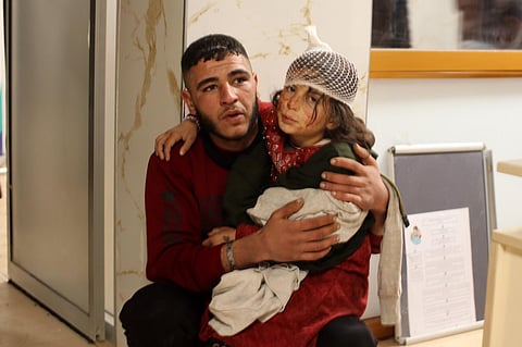 A young injured girl awaits treatment at a hospital follwoing an earthquake, in the Syrian border town of Azaz on February 6, 2023 (Photo | AFP)