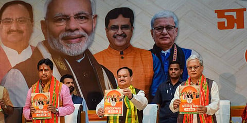BJP National President JP Nadda along with Tripura Chief Minister Manik Saha releases the party's manifesto for the Tripura Legislative Assembly elections, in Agartala. (Photo | PTI)
