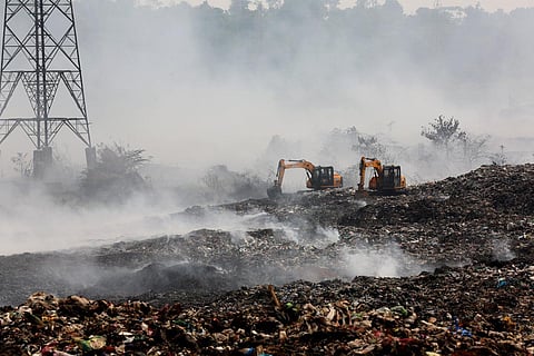FILE: Smoke billows from the waste dumped at Brahmapuram. (Photo | T P Sooraj, EPS)