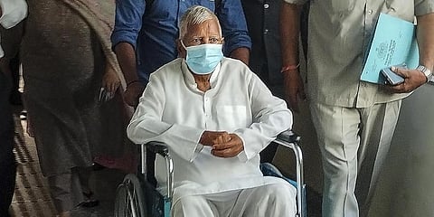 RJD chief Lalu Prasad Yadav arrives to appear before Rouse Avenue Court in connection with the land for jobs case, in New Delhi, March 15, 2023. (Photo | PTI )