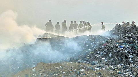 Firefighters battle the blaze at Kochi Corporation’s Brahmapuram waste treatment plant.