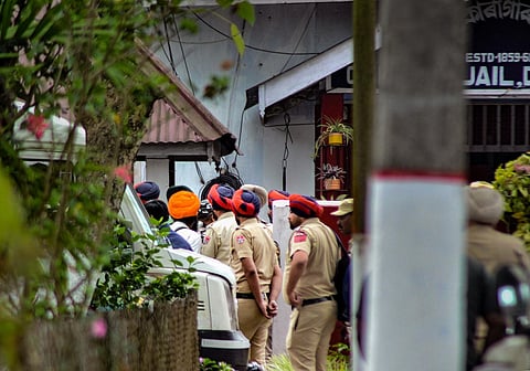 Punjab Police team at Dibrugarh Central Jail where they brought 4 associates of 'Waris Punjab De' founder Amritpal Singh, in Dibrugarh. (Photo | PTI)