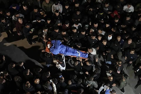 Representational Image: Palestinians carry the body of a man who was killed during an Israeli military raid in the West Bank city of Jenin, Tuesday, March 7, 2023. (Photo | AP)